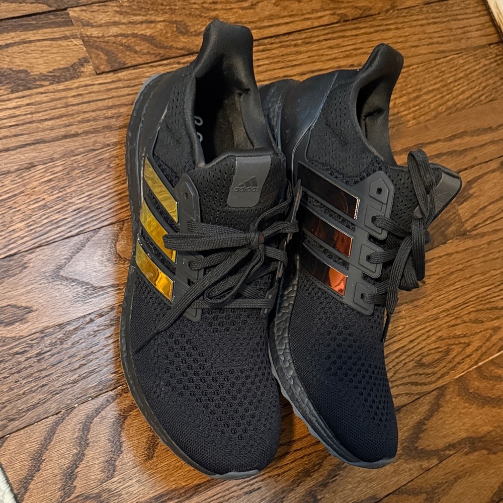 Adidas Men's Black Athletic Shoes with Gold Stripes